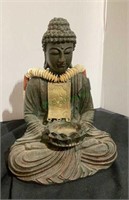 9 inch tall meditating Buddha figurine. Also