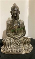 Peaceful Buddha statue stands 12 inches tall. Has