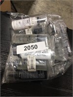 Bag of bottles of dewy finish spray