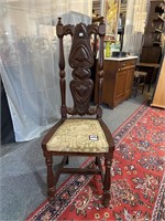 Heavily carved antique side chair