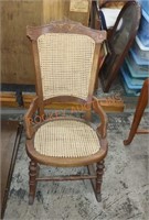 Antique Victorian canned back and seat rocker