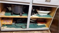 SMALL APPLIANCES IN LOWER CABINET