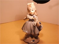 Figurine en porcelaine (fille aux fleurs 1980)