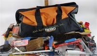 Ridgid tool duffel bag, tape measure, DeWalt bit