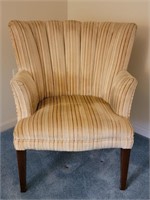 Upholstered barrel back side chair tapered legs