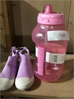 Ello water bottle and kid shoes size 6