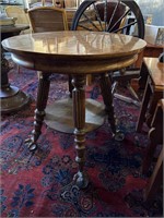 Round oak ball and claw foot table