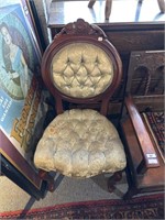Carved upholstered chair