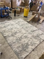 Gently used 7x10 foot fuzzy shag carpet with non