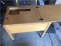 Wooden sewing machine cabinet