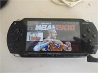 Sony PSP handheld game with three games and case