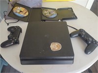 Sony PS4 console with two controllers and two