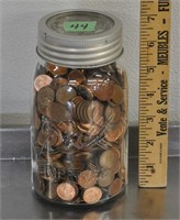 Pennies in a canning jar, unchecked