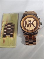 Michael kors model mk-1038 rose gold tone wrist