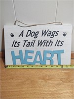 A dog wags its tail with its heart wall
