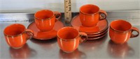 Pottery cups & saucers
