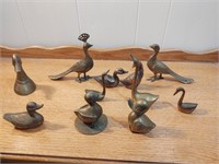 11 piece collection of brass ducks peacocks and