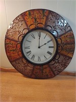 Decorative metal framed wall hung clock
