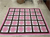 PINK, BROWN AND WHITE DRESDEN PLATE QUILT (STAIN)