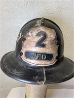 VINTAGE FIRE HELMET WITH LEATHER BADGE 7 x 11 x