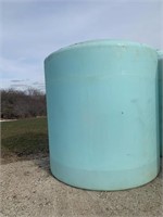 Blue poly fertilizer tank: 3000 gal, two 2" valves