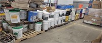 Assorted pails of paint, adhesive, misc