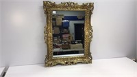 Mirror in gold poly / resin frame. Nice condition