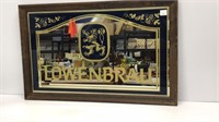 Beer advertising mirror measuring 32x20.5 inches.