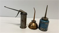 3 vintage oil cans