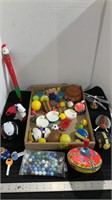 Assorted small  toys, with a vintage top