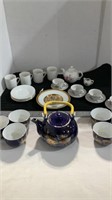 Tea pots and cups assorted items and sizes