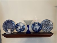 Blue Plates & Decor On Wall Shelf