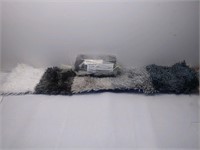 2 - 40" x 8" shag rug/blanket