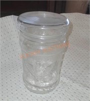 Clear jar with eagle design