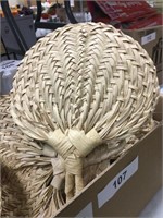 Box of small woven fans