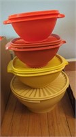 Lot of 4 Tupperware bowls with lids