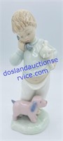 Lladro Boy & Dog Figurine