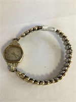 Ladies 14k gold Rolex watch w diamonds 1945