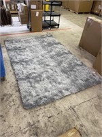 New 7.5x5 foot shaggy fuzzy white and grey rug.