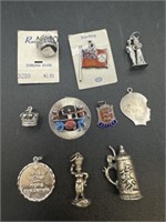 9 sterling charms approx 25grams & 1 .835 Stein