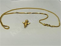 gold tone necklace & cherub pendant