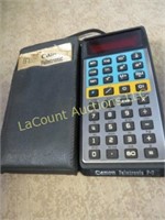 canon plamtronic F-7 calculator in case