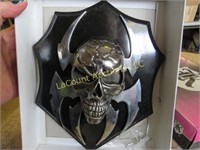 Spiked skull wall plaque display