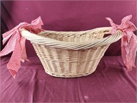 Wicker laundry basket with bows 24" wide 10" tall
