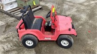 Kid’s red Jeep