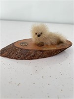 Figurine Made of Seal Fur On Wooden Base