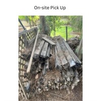 Large Pile of Wood fencing planks