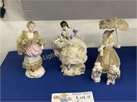 THREE PORCELAIN FIGURINES WITH LACE