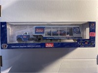 Unopened DIECAST MALLORY Truck hauling Car