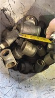 Half a bucket of pipe fittings